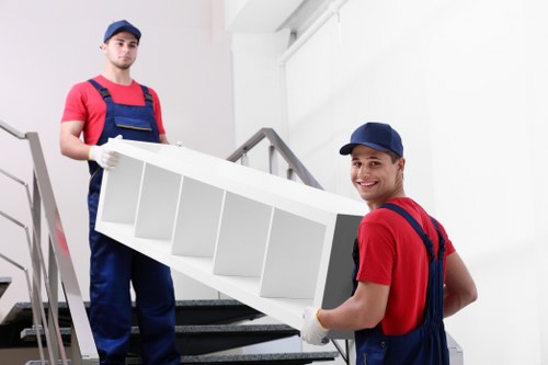 Careful unpacking service helping a family settle into a Putney property