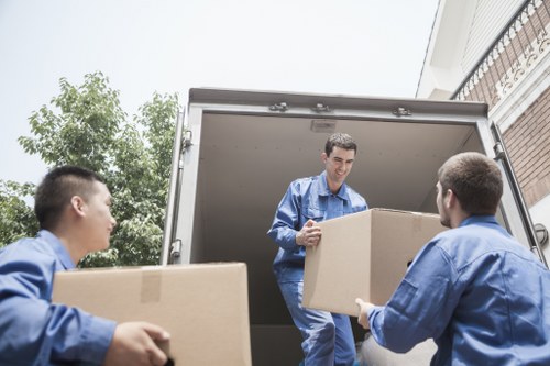 Trained moving staff handling furniture with care